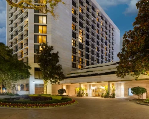The elegant residential-style facade of the Houston Grand Hotel near River Oaks District