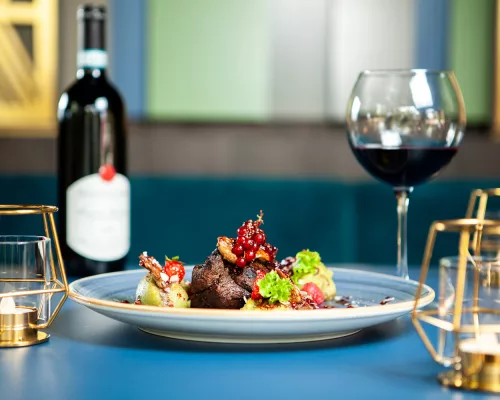 An intimate 8-seat counter dining setup at Jantra restaurant in Houston's East End